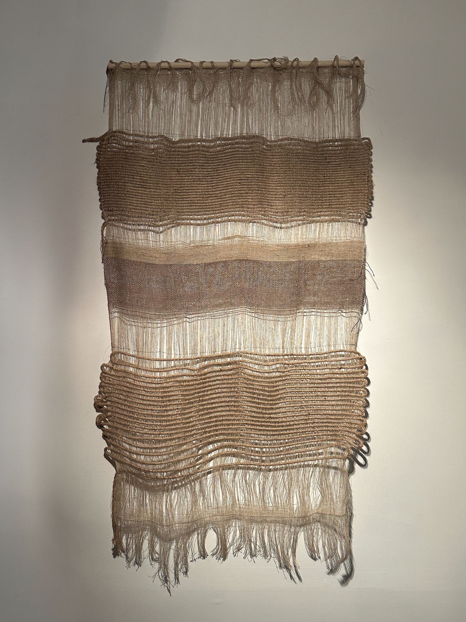 “A Tattered Mundane,” woven installation, 35” x 70”. Jute, hemp, linen, synthetic blend. November 2024.
Macomber floor loom, two shafts. Tabby weave.
Featured in Dorothy H. Hoover Library’s installation, “Material Fragments: a Space for You