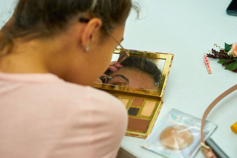 putting on makeup, makeup, looking in the mirror