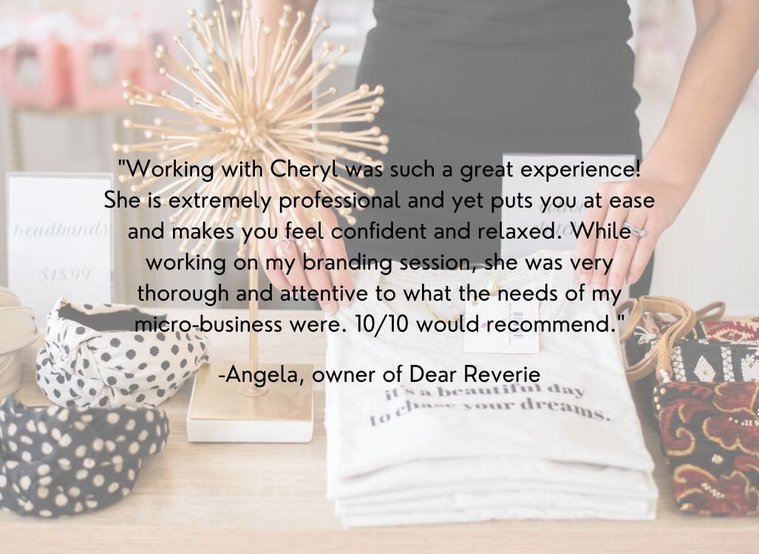 graphic with a branding client's review words in black over a photo of the client setting up her merchandise for display at a branding session in OKC
