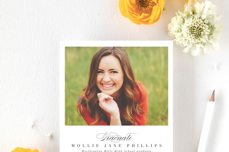 photo of a graduation announcement card featuring a high school girl and her senior photos