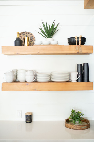 photo of open kitchen shelving with dishes and decor taken for a realtor branding session as home stock photos