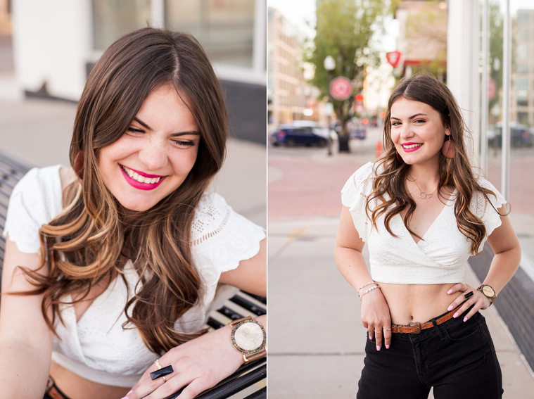 two photos of a high school senior girl with long brown hair wearing a white top and black jeans sitting and laughing and standing on the sidewalk with hands on her waist in Automobile Alley in Oklahoma City, Oklahoma