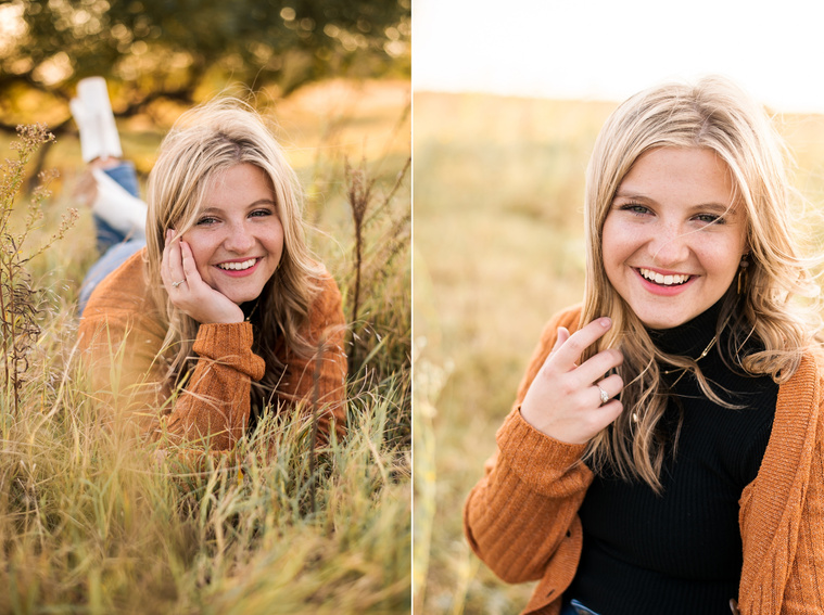 two photos of a high school senior girl with blond hair wearing a rust colored sweater and jeans, sitting in the grass with chin in hand and standing holding tips of hair and smiling