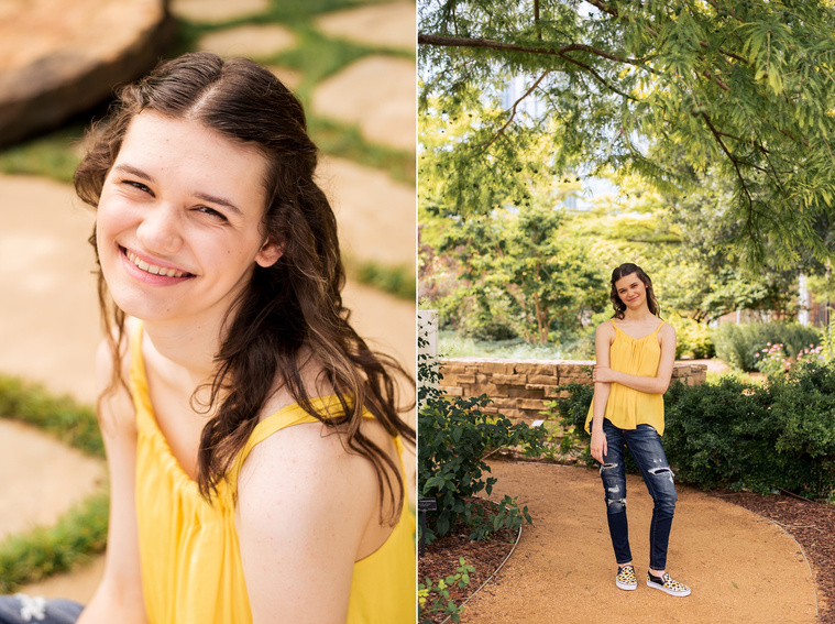 two photos of a high school senior girl with long brown hair wearing a yellow top and jeans stands on a path with trees around and sits on a rock path smiling at Myriad Gardens in Oklahoma City