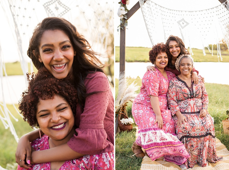 A mom and teen daughter dressed in boho style pose in front of boho decorations and a field and pond in the country in Oklahoma