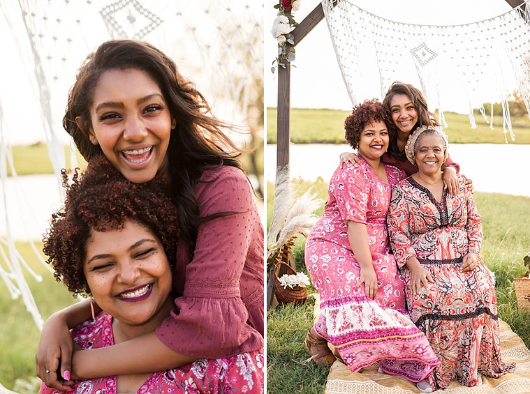 A mom and teen daughter dressed in boho style pose in front of boho decorations and a field and pond in the country in Oklahoma