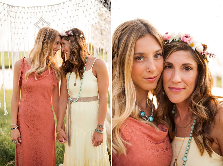 A mom and teen daughter dressed in boho style pose in front of boho decorations and a field and pond in the country in Oklahoma