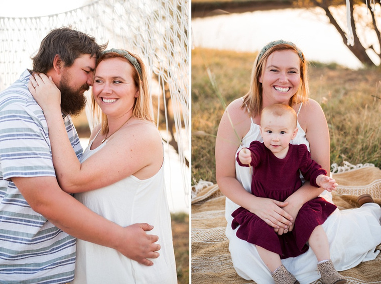 A husband and wife snuggle, a mom holds her toddler daughter and smiles  in a field at a family photo session in Tuttle, Oklahoma