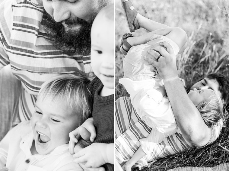 black and white images of a dad and his son and daughter playing  in a field at a family photo session in Tuttle, Oklahoma