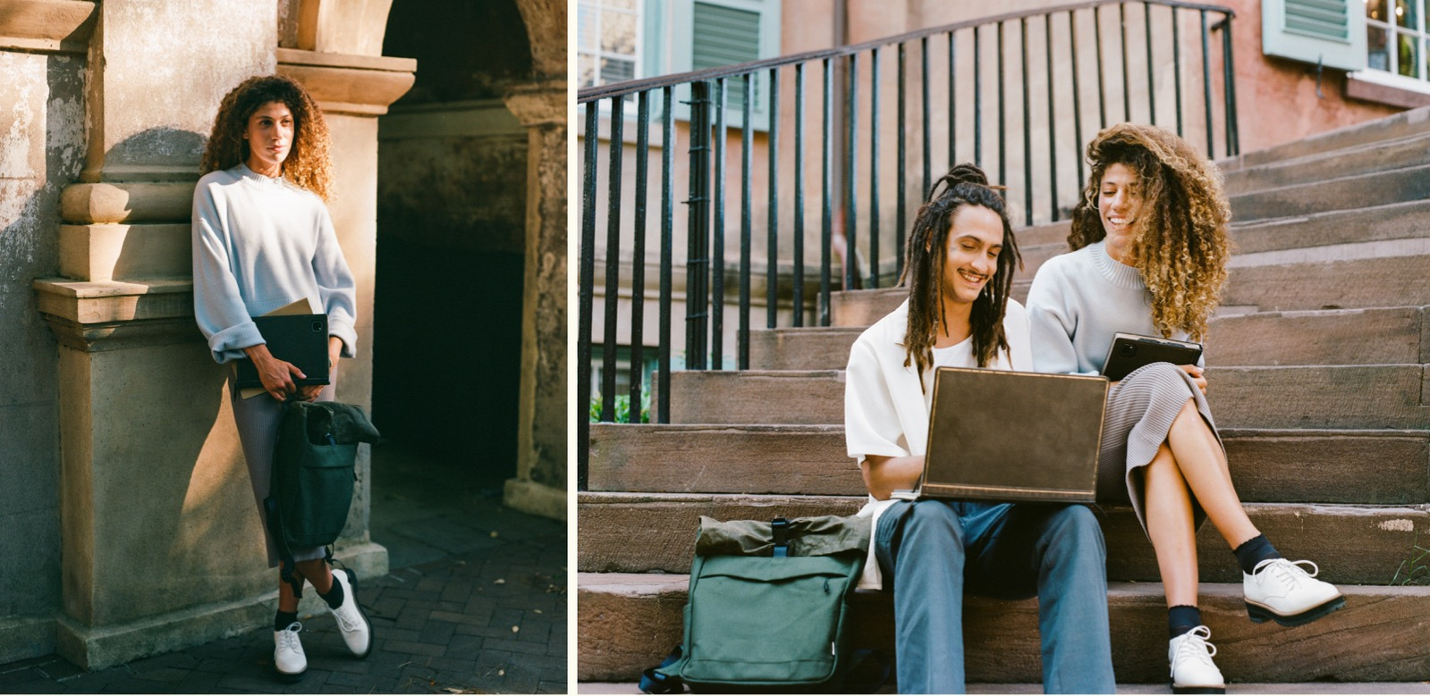 Two students talking with one another on the steps of a historic college building 