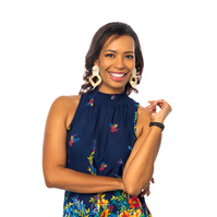 Image shows Isabel De Montiel with hands on aqua white background. Isabel De Montiel is Atlas Studios preferred image stylist and consultant. 