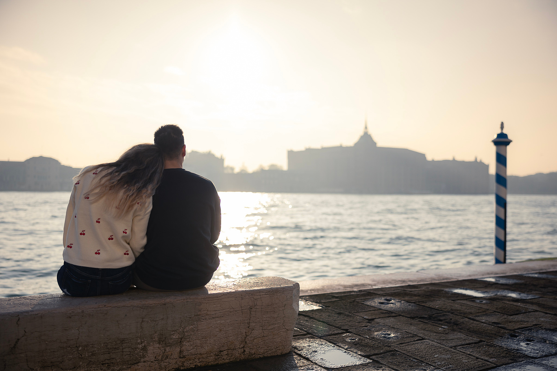 romantic hug at sunset on Giudecca Canal