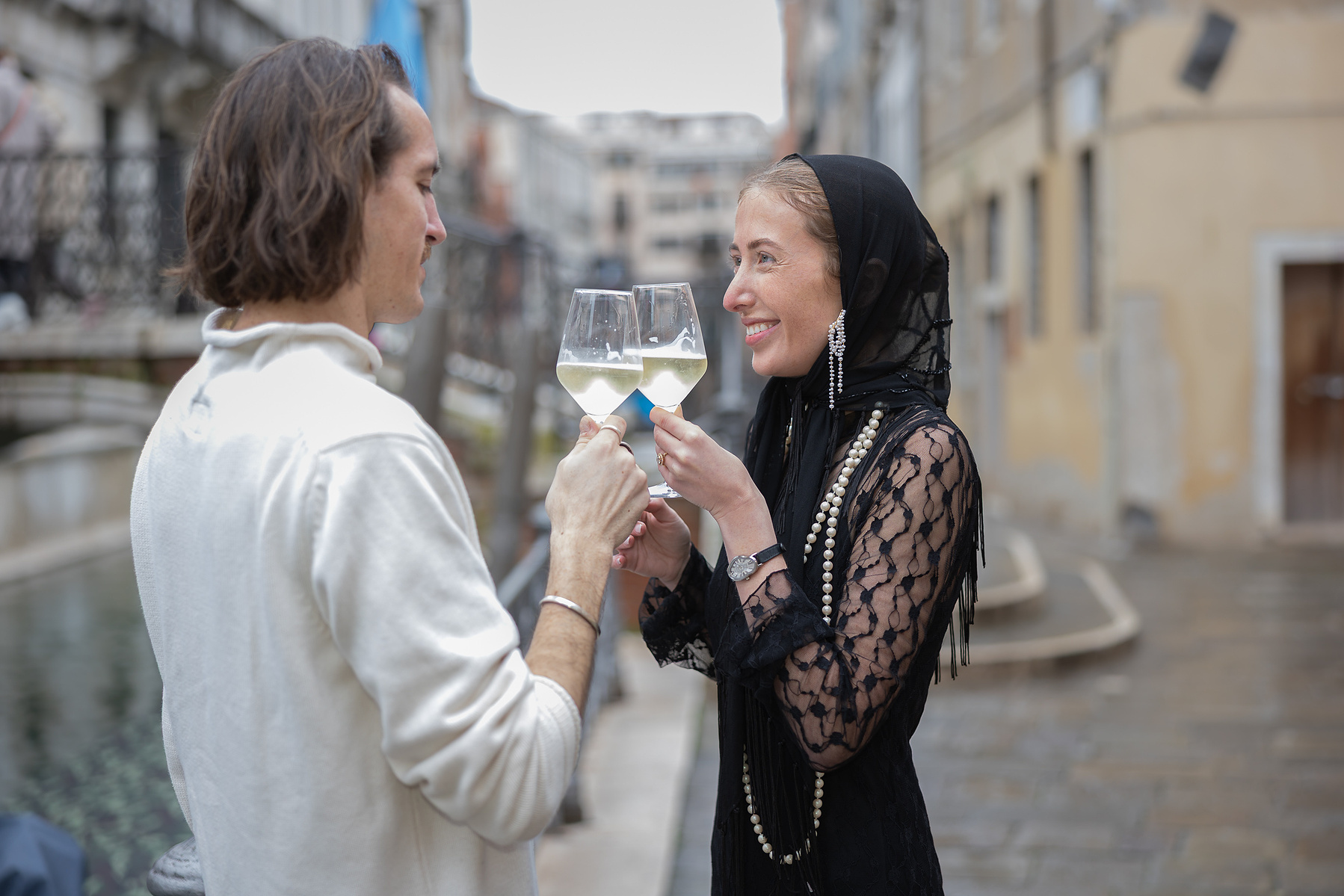 couple having a toast in Venice