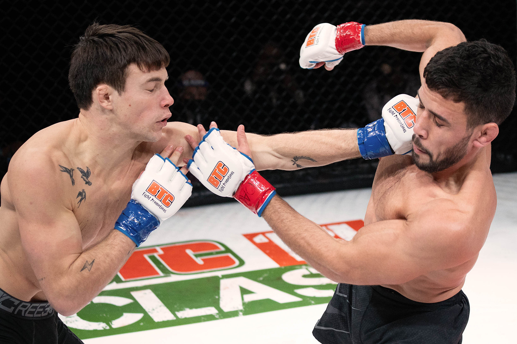 Thomas Glot lands a punch to the face of Xavier Nash during a 165-pound division fight at the BTC 13 Power event at the Meridian Centre on Nov. 20, 2021 in St. Catharines, Ont. Nash won the fight by unanimous decision. Photo by Alex Lupul