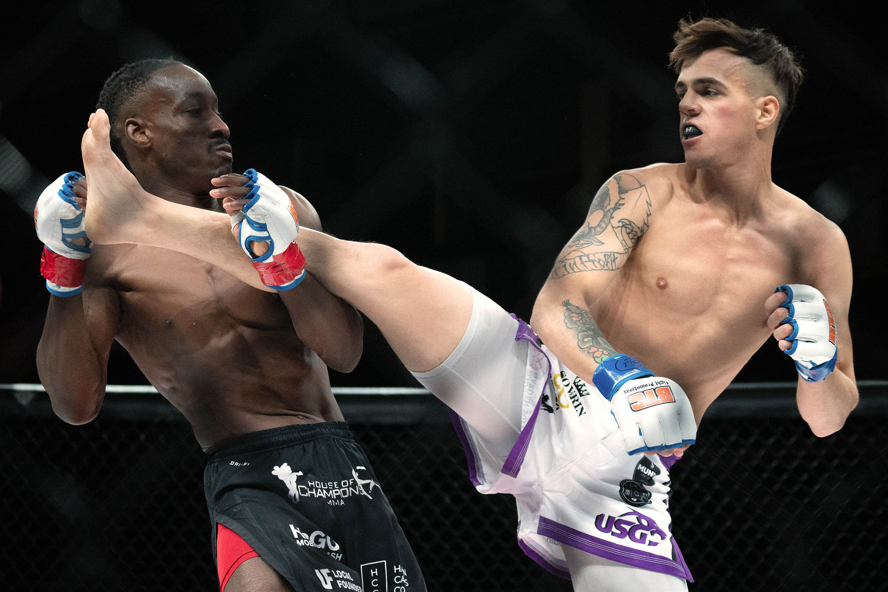 Nate Ledger attempts to land a kick to the face of Binaebi Otoru during a flyweight fight during the BTC 13 Power event at the Meridian Centre on Nov. 20, 2021 in St. Catharines, Ont. Otoru won the fight by unanimous decision. Photo by Alex Lupul