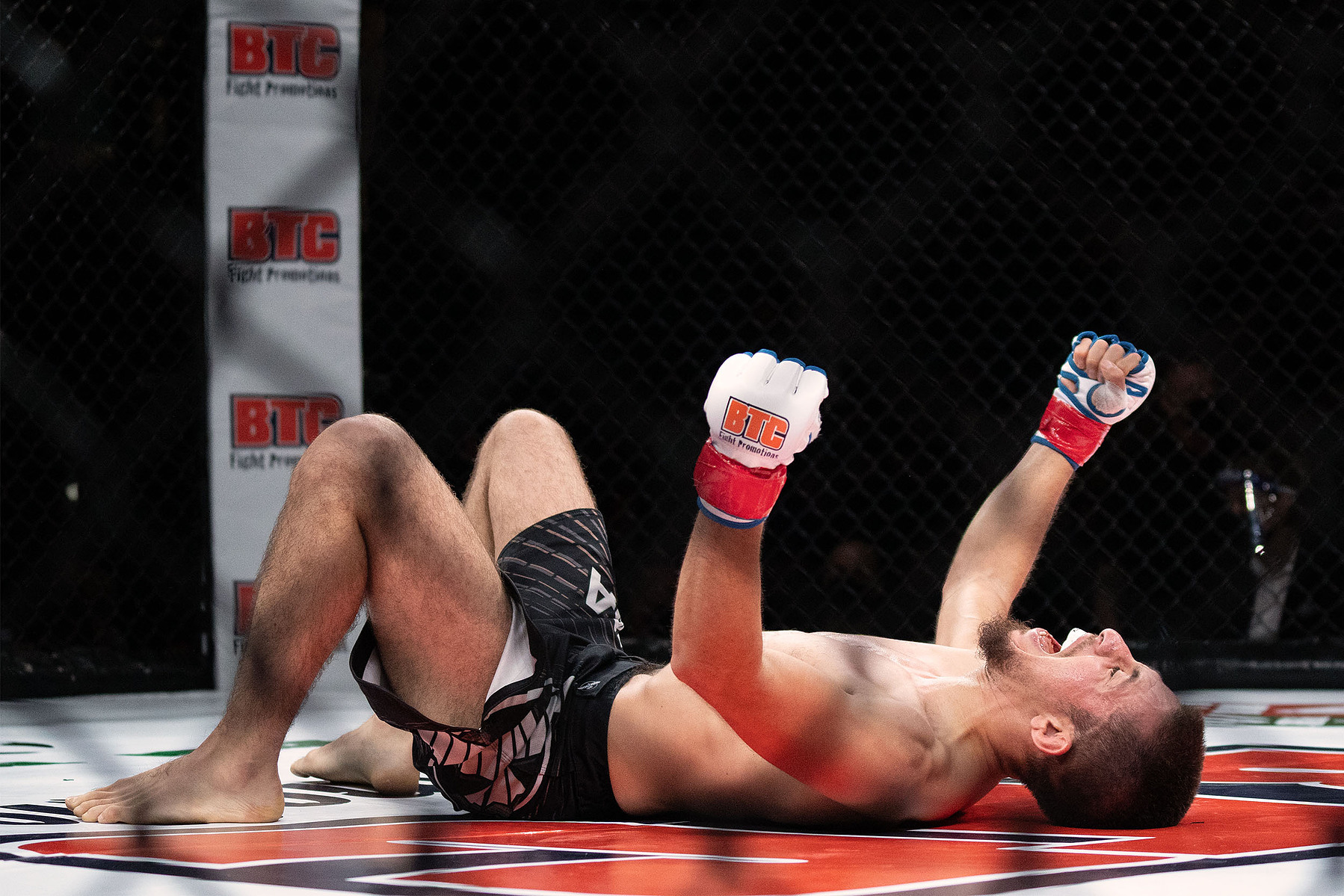 Ariel Zuniga celebrates following his defeat of Harley King in their bantamweight fight during the BTC 13 Power event at the Meridian Centre on Nov. 20, 2021 in St. Catharines, Ont. Zuniga won the fight by submission. Photo by Alex Lupul