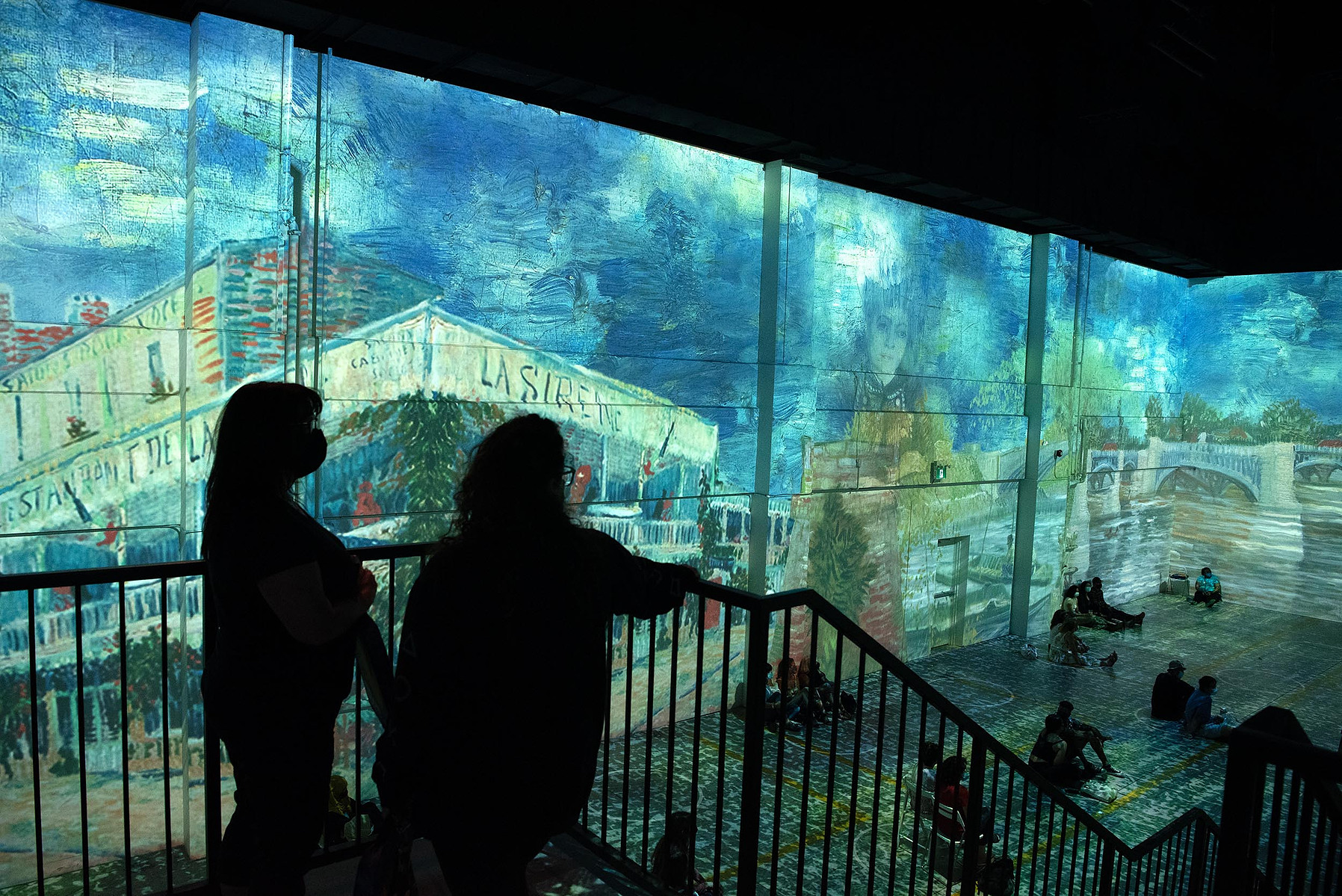 TORONTO, Ont. (11/09/21) - Visitors to Immersive Van Gogh--an audio-visual experience where artworks by Vincent Van Gogh are projected onto walls--are photographed in Toronto, Ont. on Sept. 11, 2021. Photo by Alex Lupul