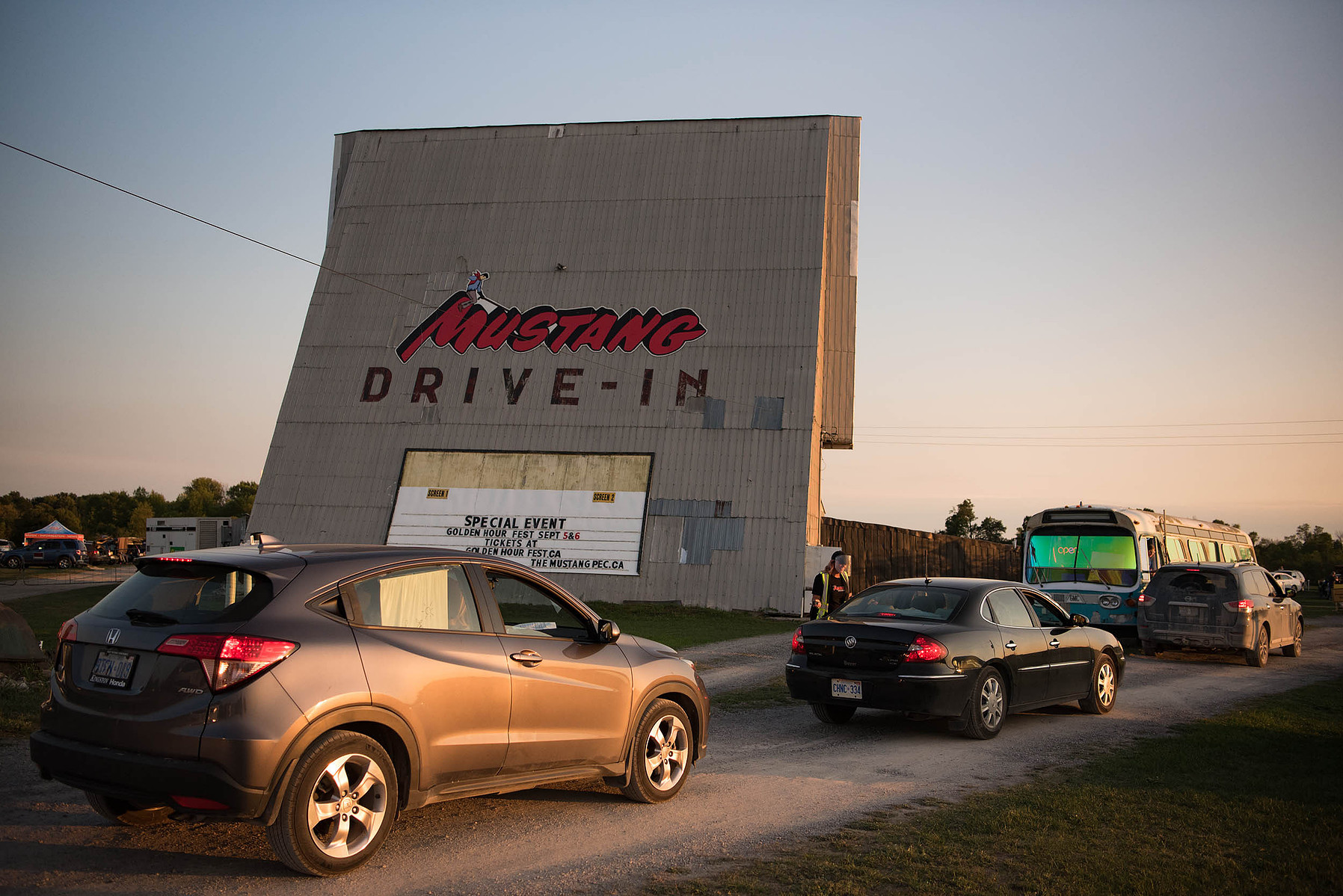 A line of cars waits to enter the Golden Hour Festival in Prince Edward County.