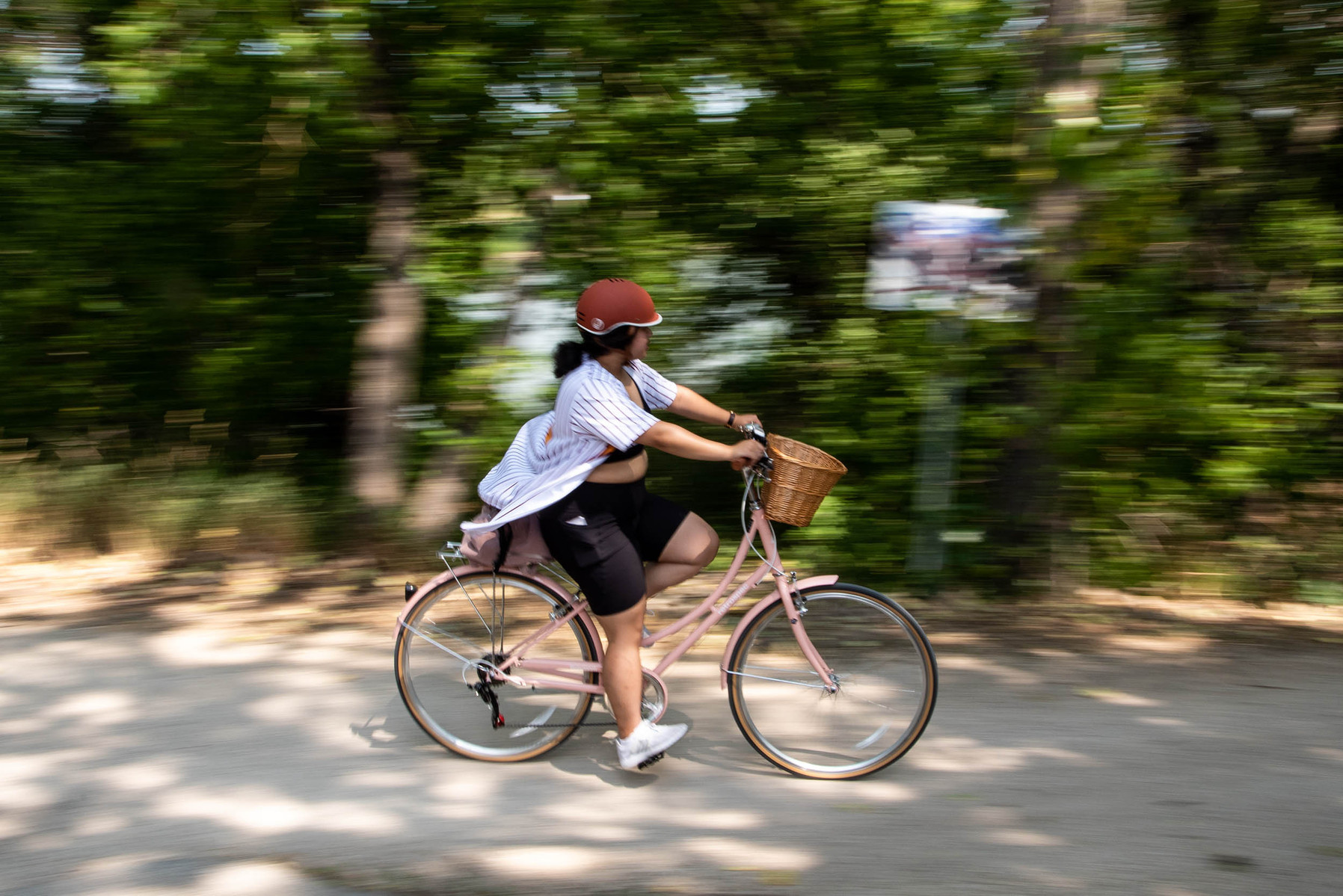 WINNIPEG, Man. (24/07/21) - Rheanne Millet takes part in the Tour de Glace, a 20-kilometre recreational event which makes stops at four local ice cream shops, in Winnipeg on July 24, 2021. Photo by Alex Lupul