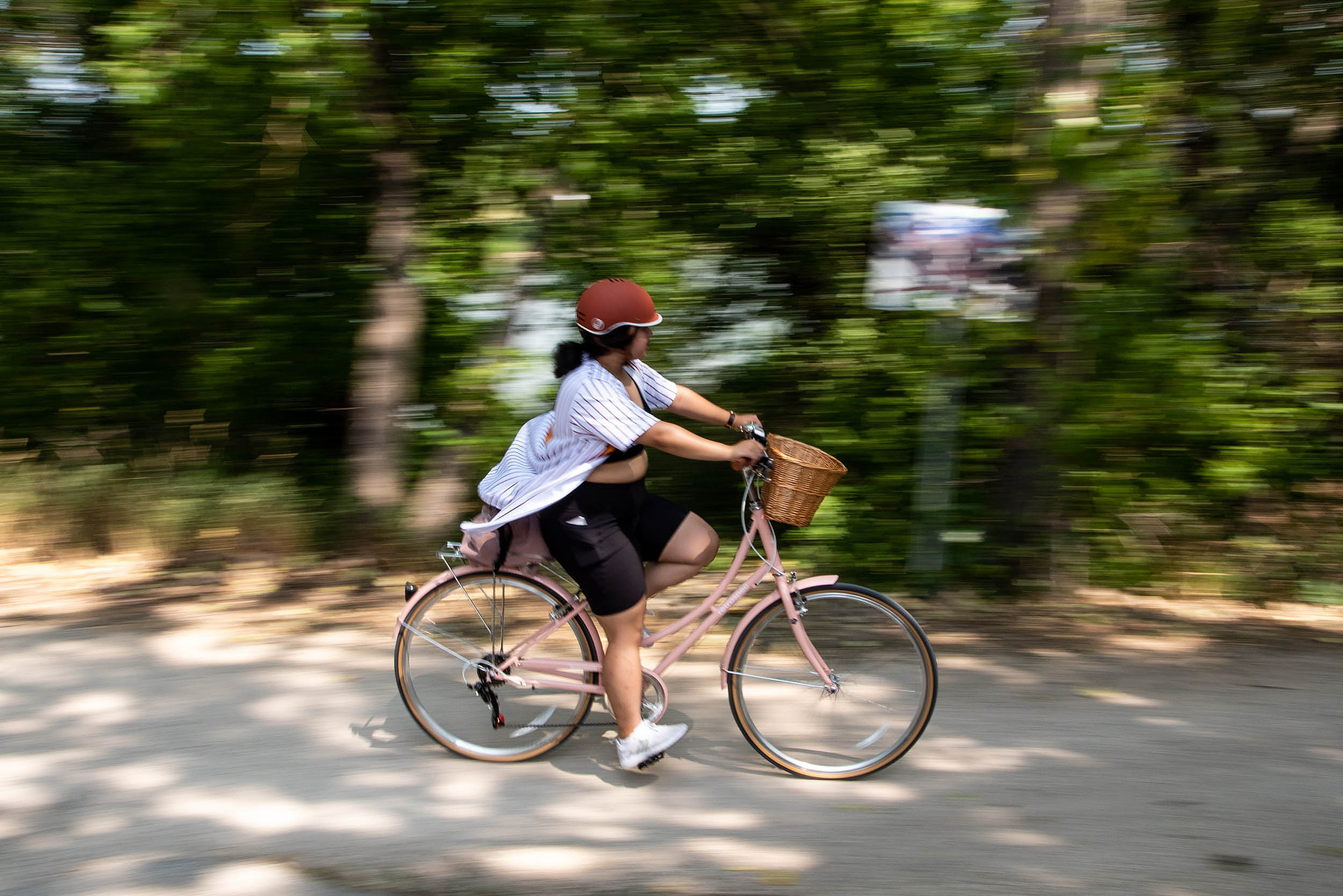 WINNIPEG, Man. (24/07/21) - Rheanne Millet takes part in the Tour de Glace, a 20-kilometre recreational event which makes stops at four local ice cream shops, in Winnipeg on July 24, 2021. Photo by Alex Lupul