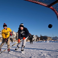 BELLEVILLE, Ont. (30/01/21) - Carson McNulty scores a goal despite the defence of Bradly Drinkle on the frozen Victoria Harbour near the Bay of Quinte Yacht Club in Belleville, Ont. on Jan. 30, 2021. Photo by Alex Lupul