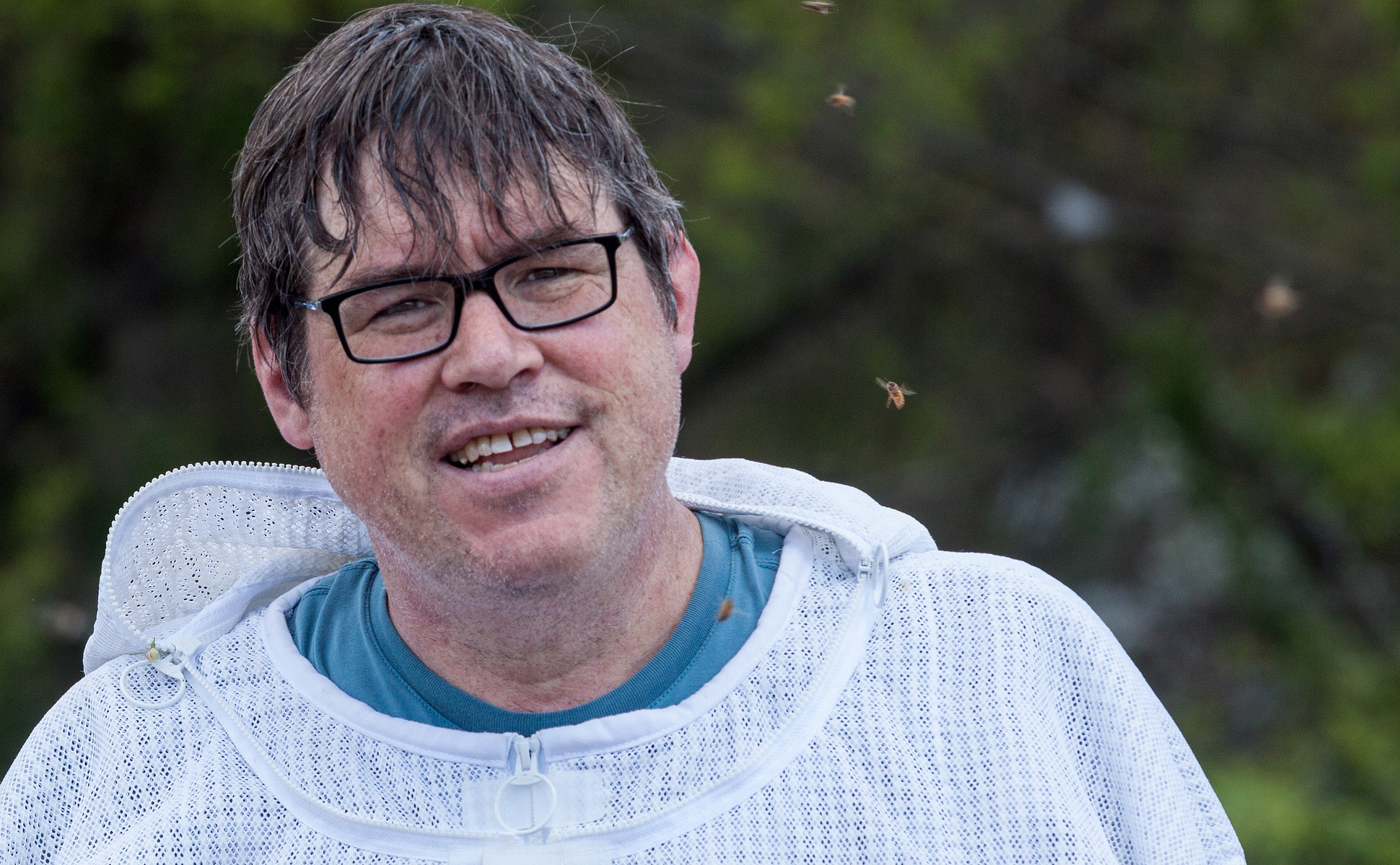 Dave Harrod taking a break while installing bees at the new apiary.