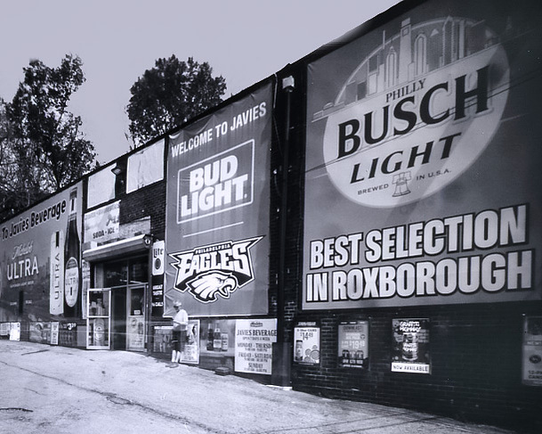 Selfie in front of Javie's beverage in Roxborough section of Philadelphia, PA. Shot using a pinhole camera and paper negative.