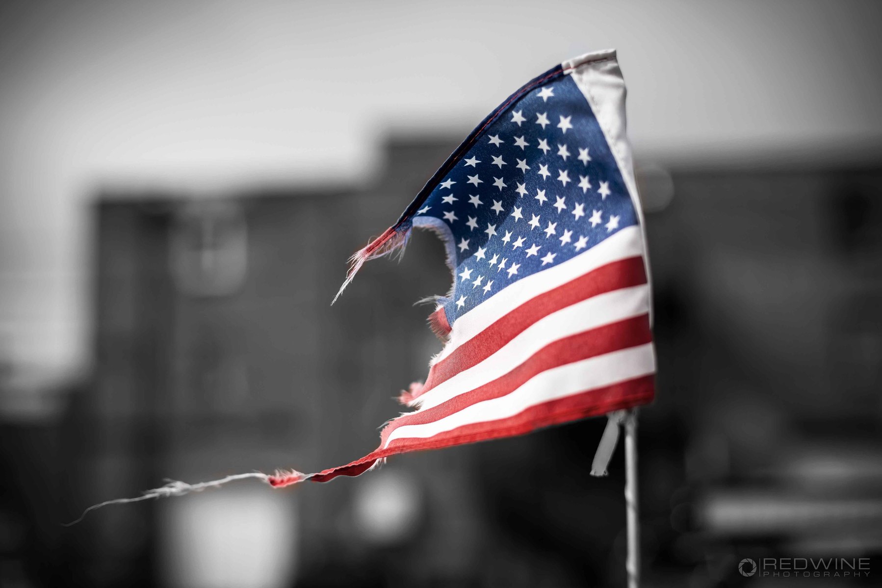 An image of a torn American flag.