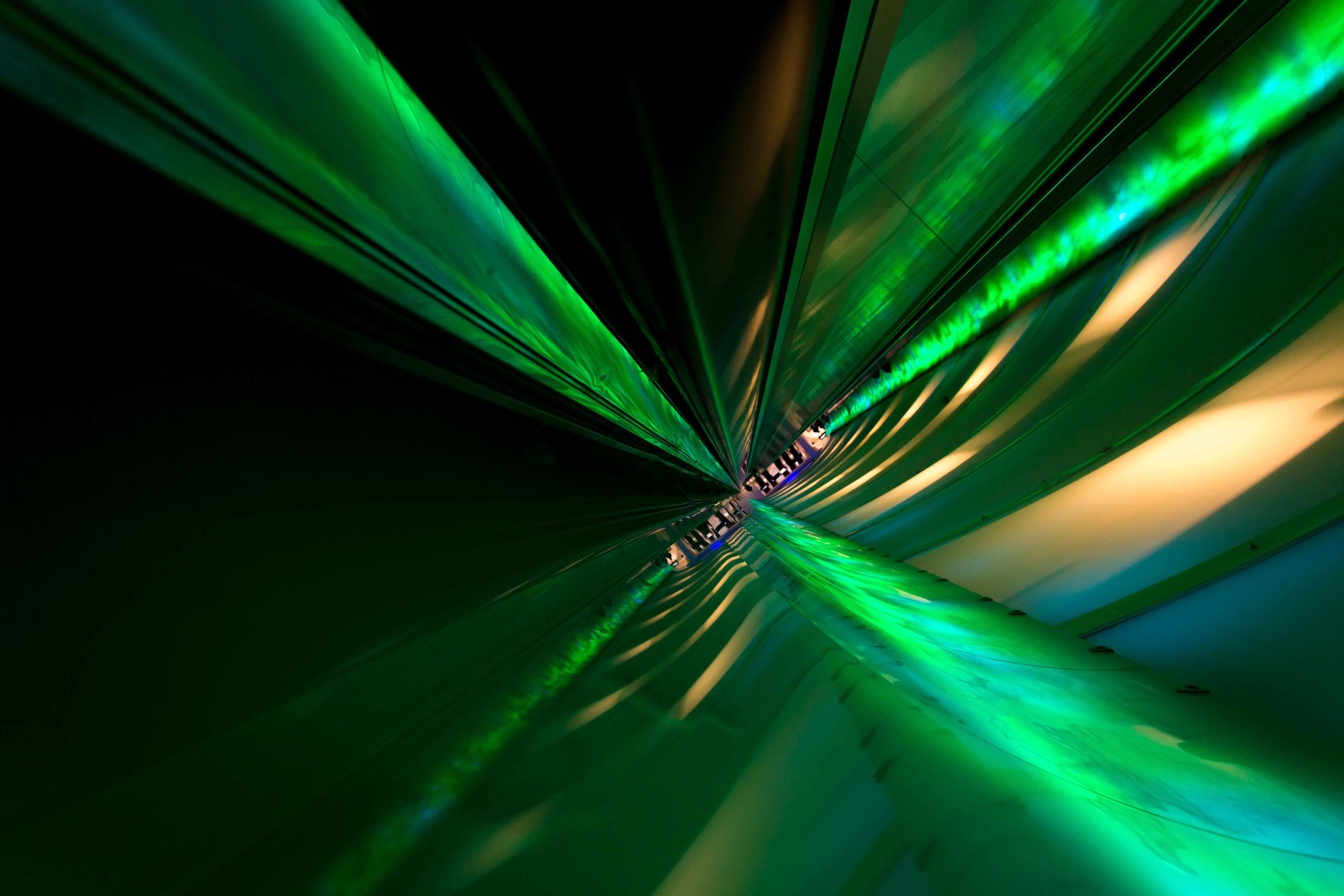 An abstract showing a moving escalator upside down at Chicago's O'Hare airport.
