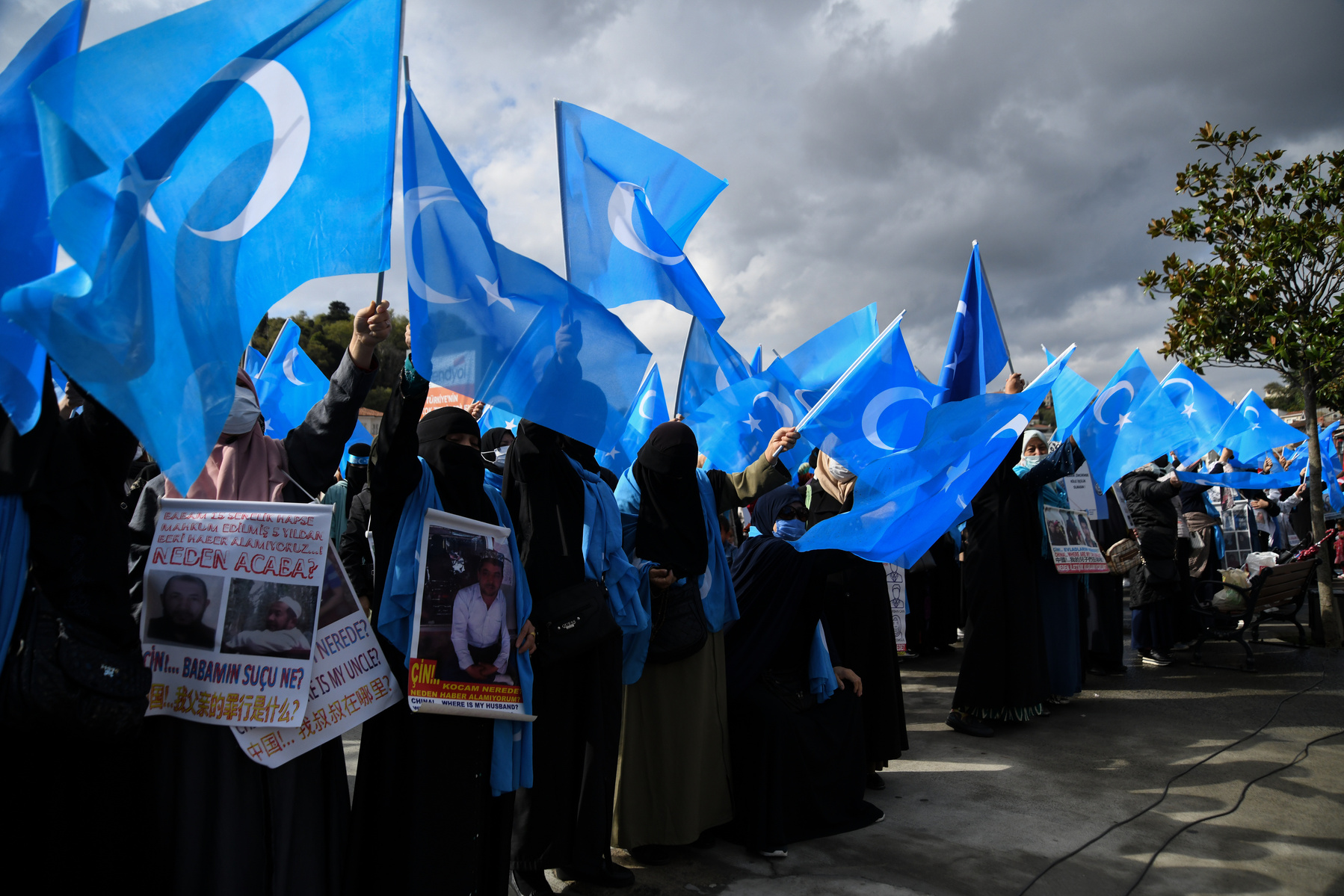 Ethnic Uyghur women participate in a protest in front of the Chinese consulate in Istanbul on 1 October, 2021, which marks the 66th anniversary of the establishment of the Xinjiang Uyghur Autonomous Region (XUAR).