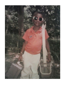 Day out with my father, Mansong Senior, shooting wild life for postcards.  Age 6 - 7