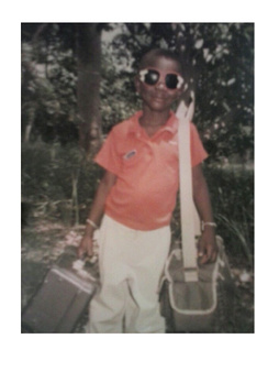 Day out with my father, Mansong Senior, shooting wild life for postcards.  Age 6 - 7