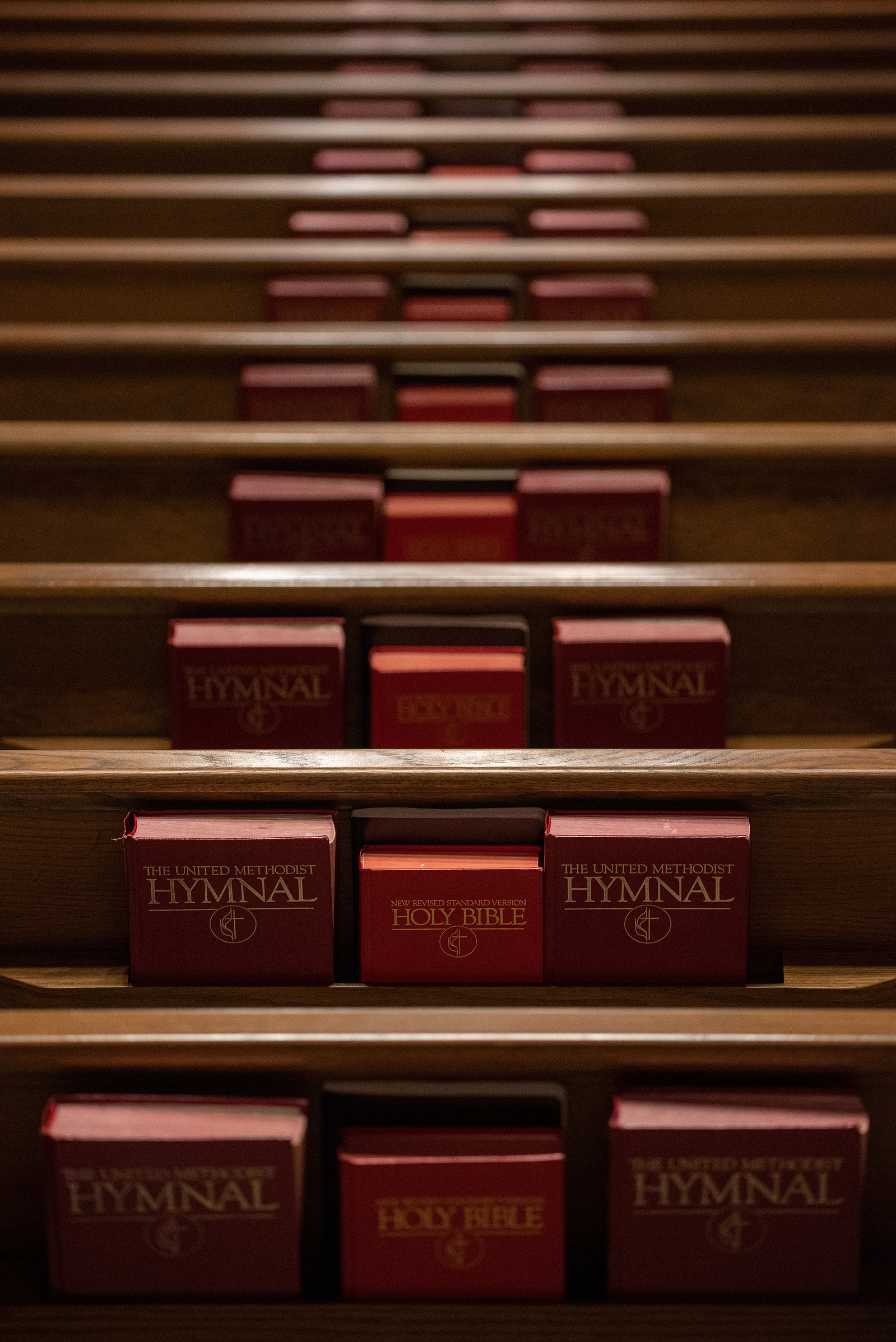 Holy Bibles and United Methodist Hymnals sit in the back of empty church pews at College Avenue United Methodist Church on Sunday morning. College Avenue United Methodist Church has been doing virtual service since mid-March when the coronavirus pandemic