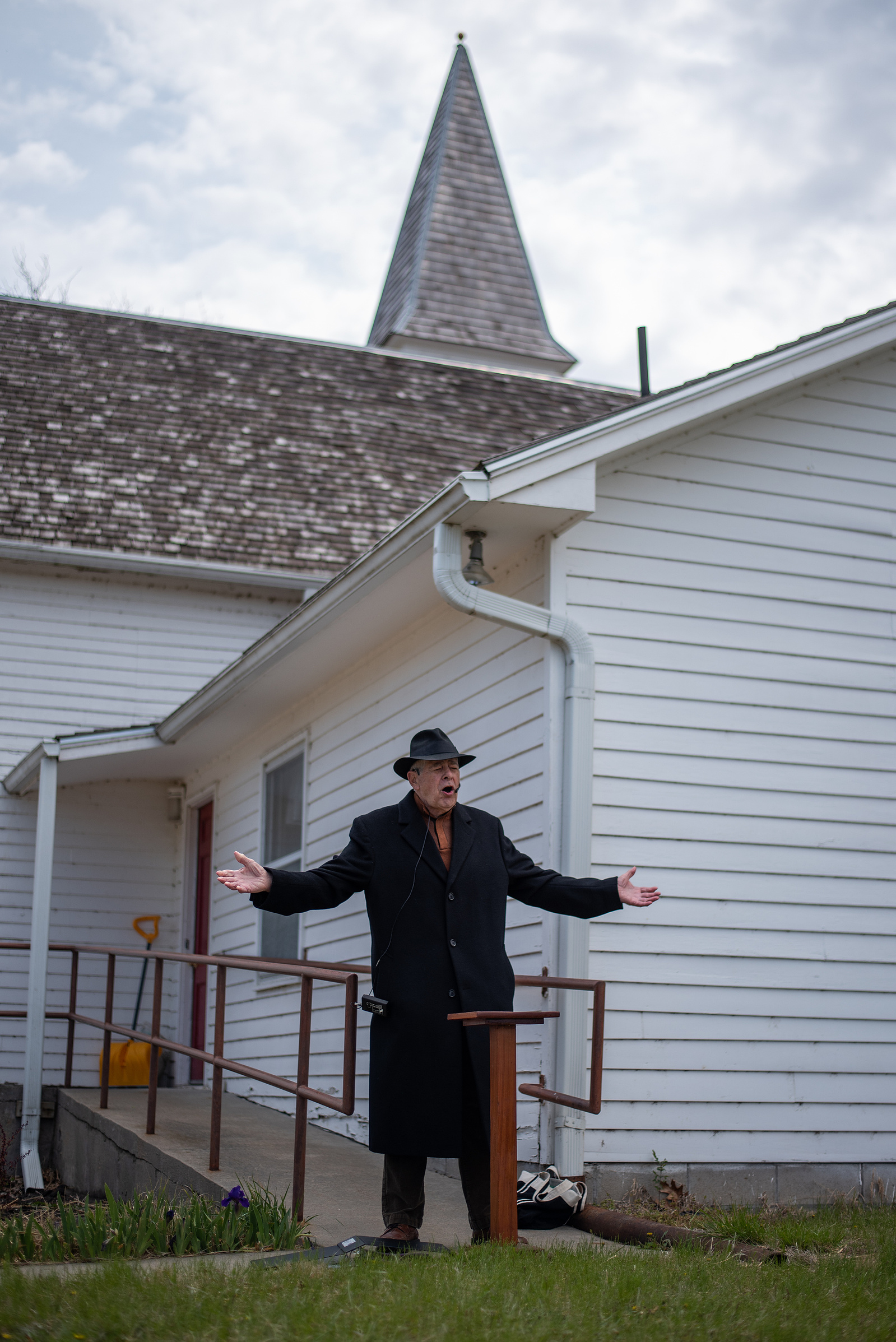 Pastor Paul Barkey leads everyone in prayer outside of Ashland Community Church on Sunday morning.