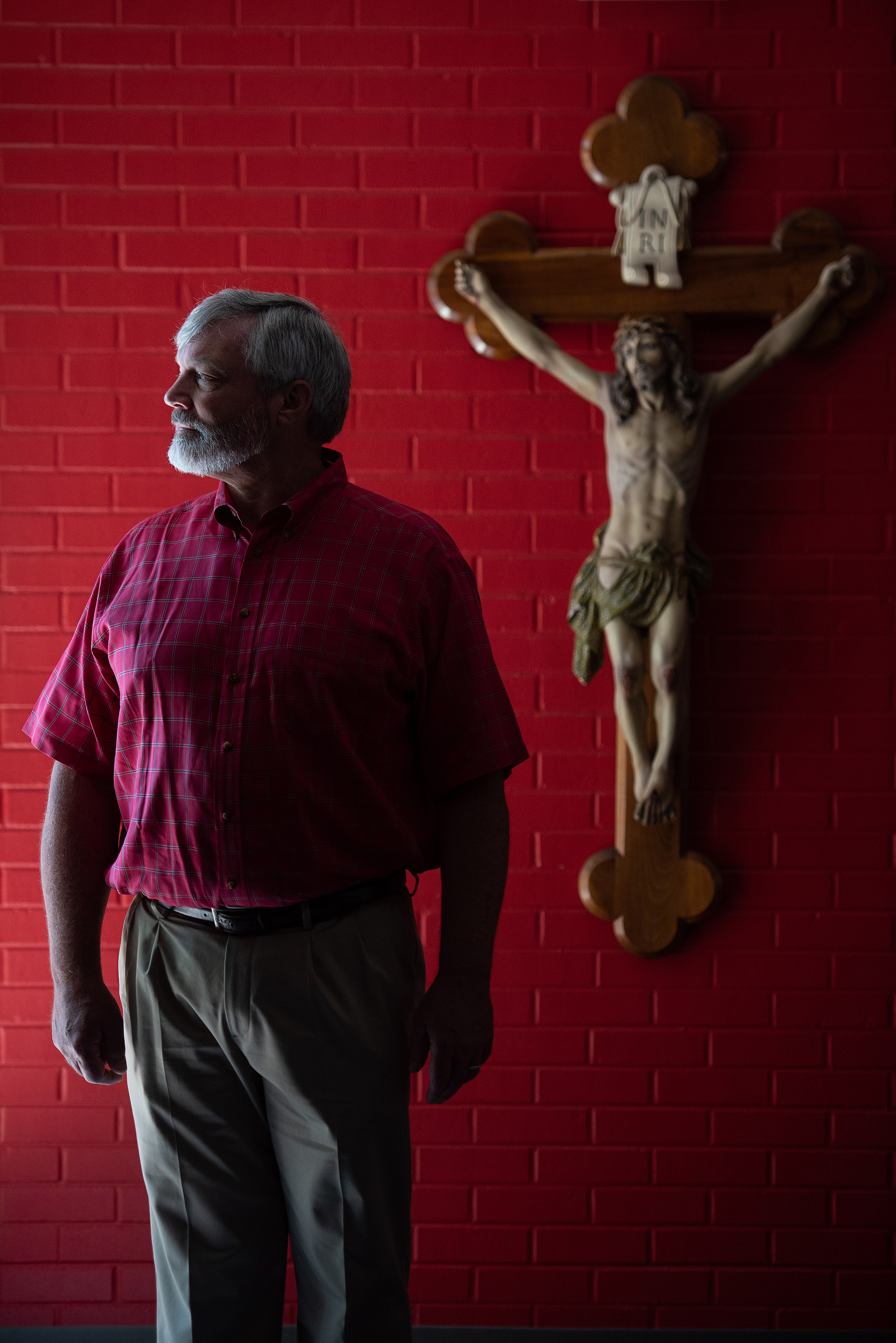 Mike Hubka, the newly appointed Principal of Manhattan Christian School, stands in the hallway of Manhattan Christian School on Friday.