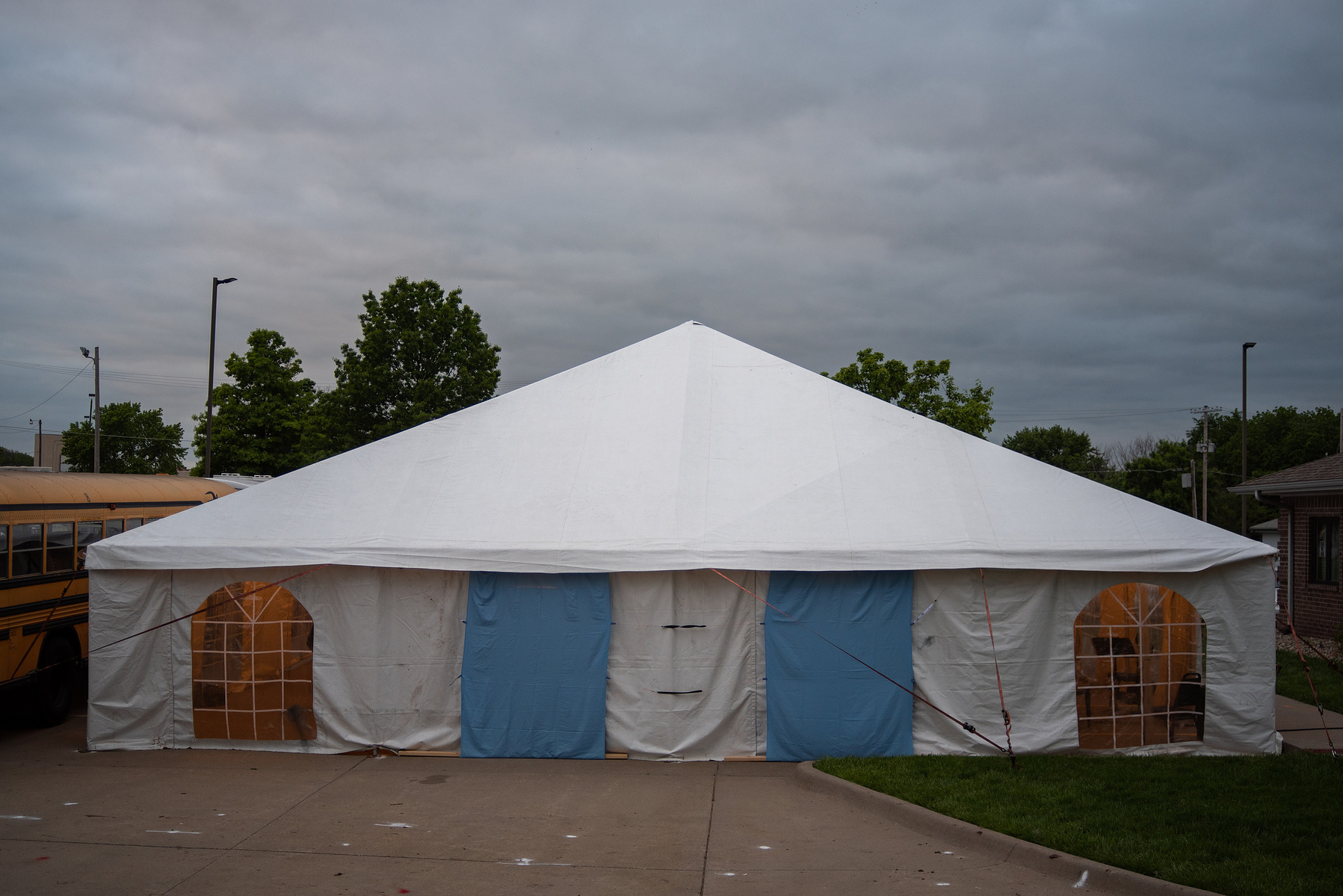 Pastor Stephen Henderson preaches in the tent at Harvest Baptist Church on Wednesday. The tent is on loan from Berean Baptist Church in Wichita, Kansas.