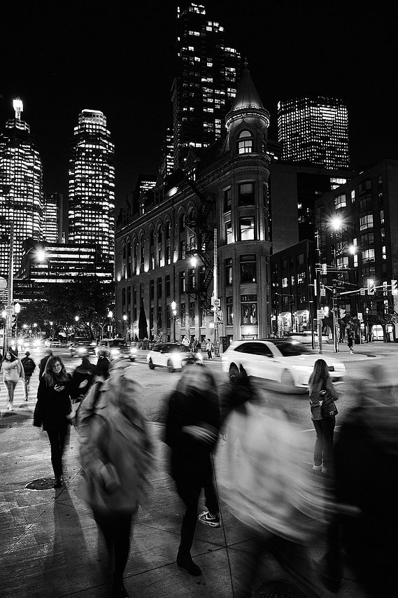 Capturing the vibrant energy of  downtown Toronto life at night, this photo showcases urban streetscapes in motion. Learn cityscape photography techniques in our Ontario workshops, mastering lighting and composition for urban storytelling.