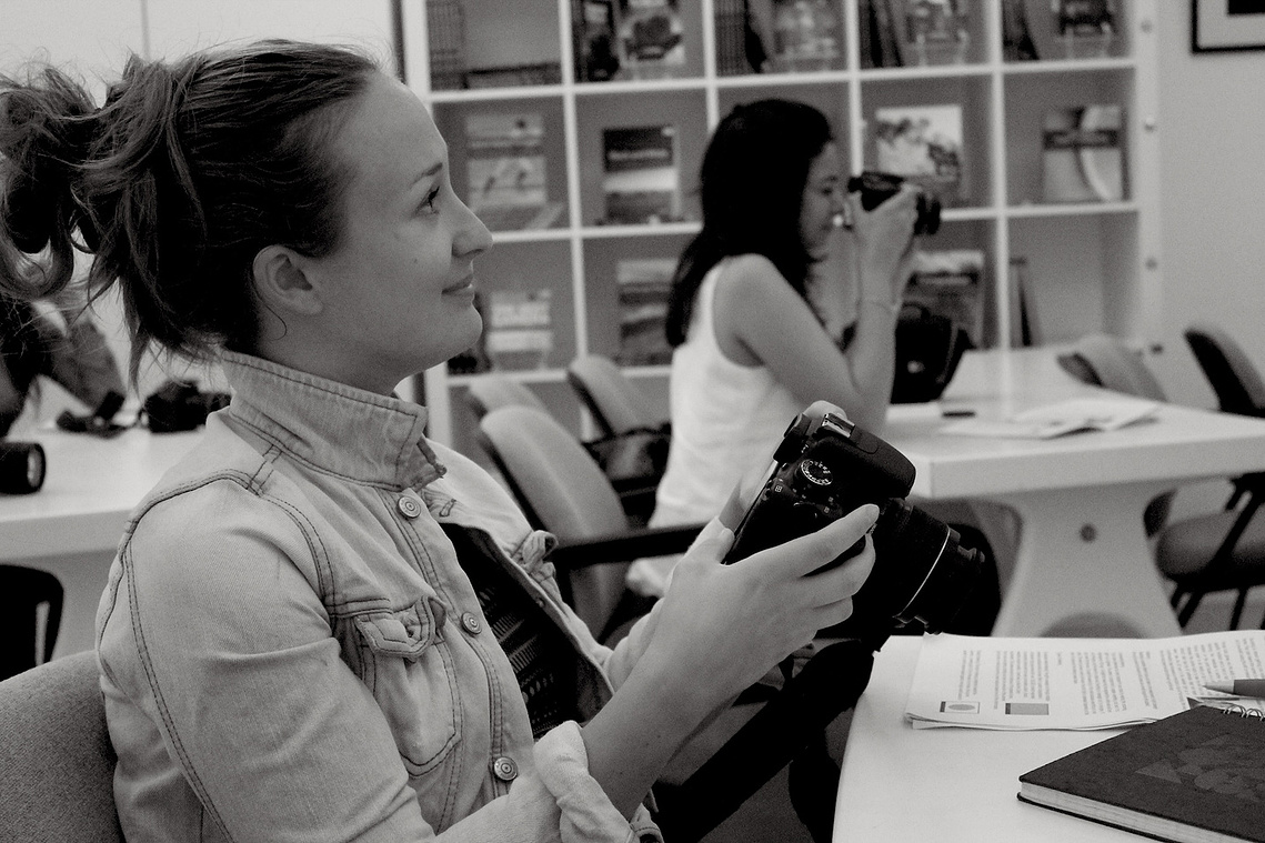 Enthusiastic students engage in hands-on photography sessions, capturing creativity and technique in action. Join our Ontario-based workshops to sharpen your camera skills and elevate your photographic artistry