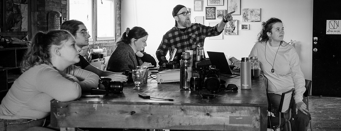Photography workshop attendees focused on hands-on camera training in  Ontario. Our workshops are designed for all skill levels, offering in-depth photography techniques and practical camera handling to help you capture stunning images with confidence