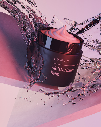 Made with CGI. A Lumin moisturising cream being splashed with water.