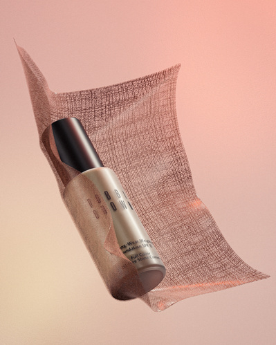 Made with CGI. A Bobbi Brown beauty foundation flying into a piece of fabric