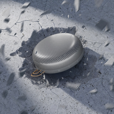 A mixture of Photography and CGI. A Bang and Olufsen speak smashes into the ground breaking the concrete.