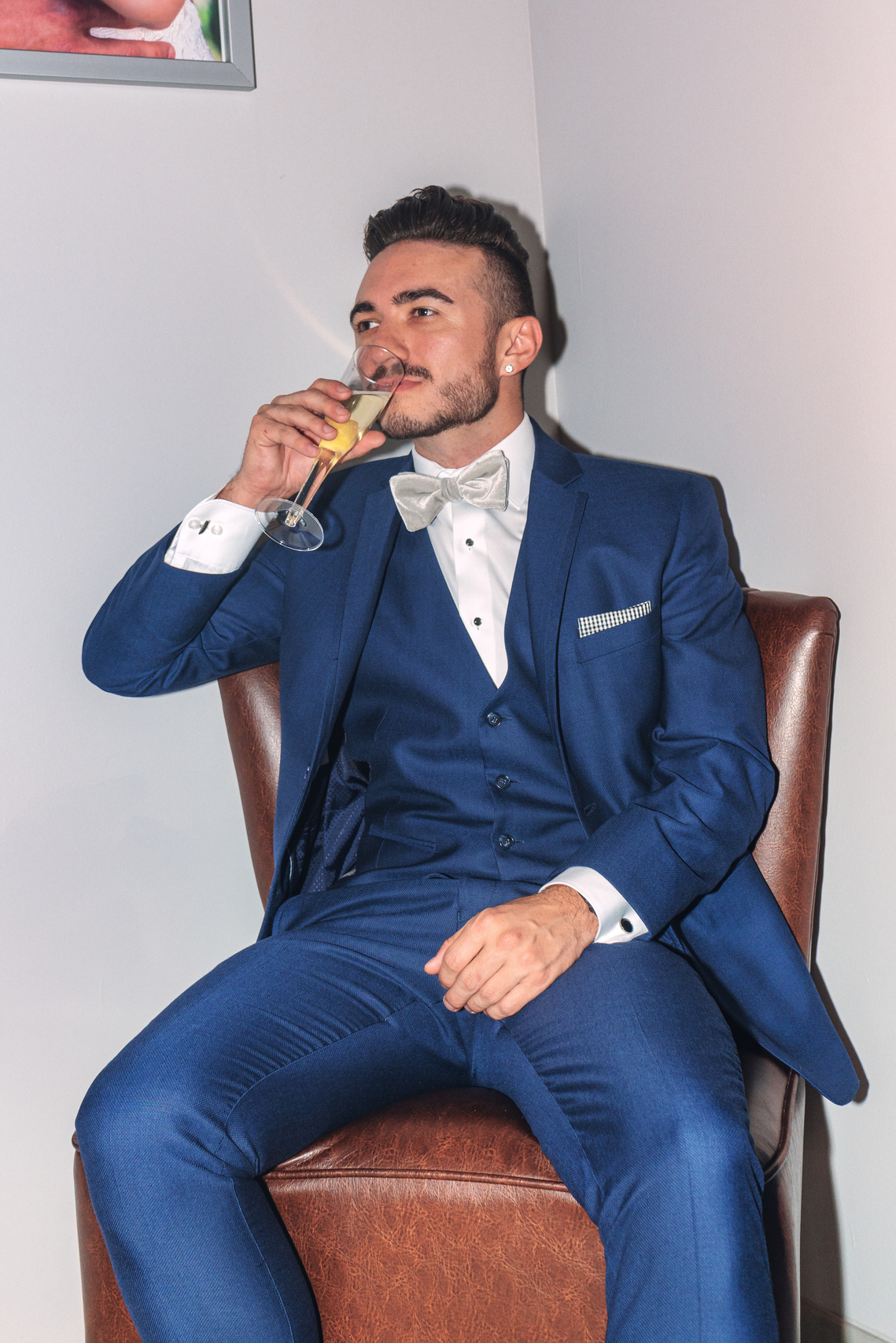 Scotland Commercial Fashion Photography of male model posing in tuxedo for Friar Tux suit rental - Photography by Nate Cleary