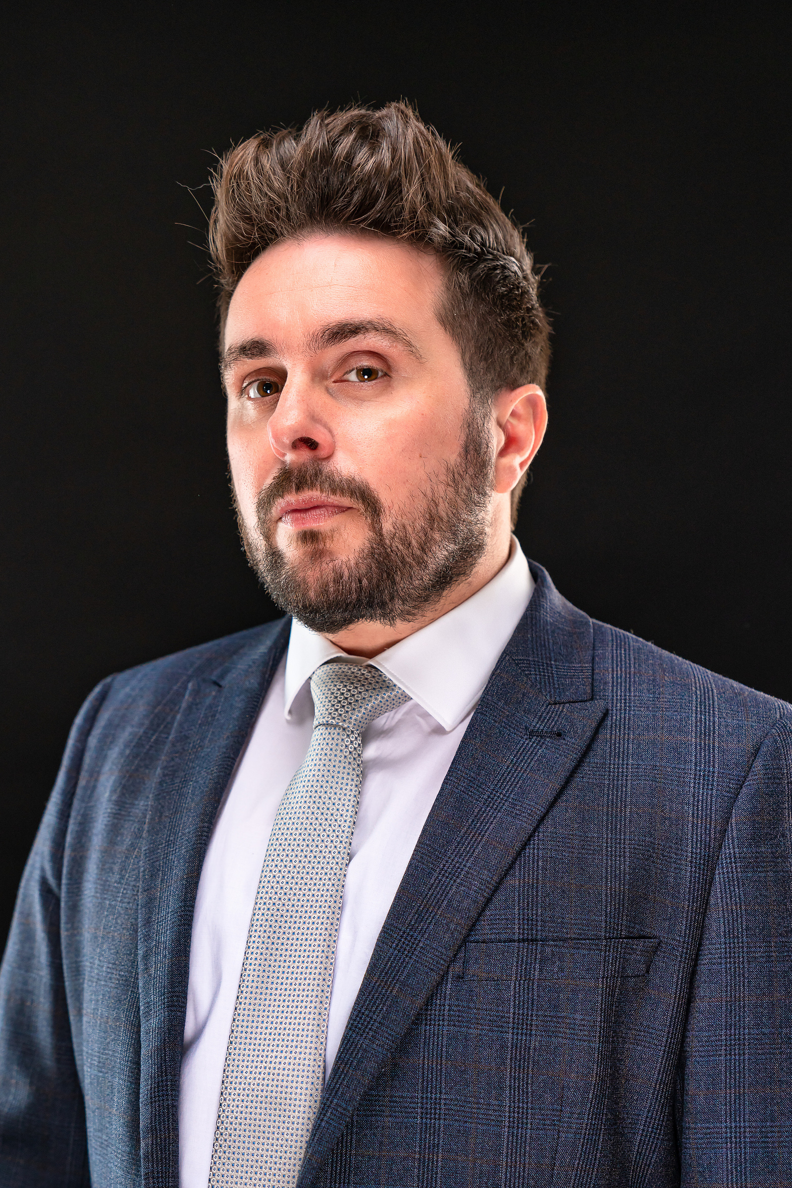 Scotland client posing for studio headshots from Inverclyde Physiotherapy in Glasgow - Photography by Nate Cleary