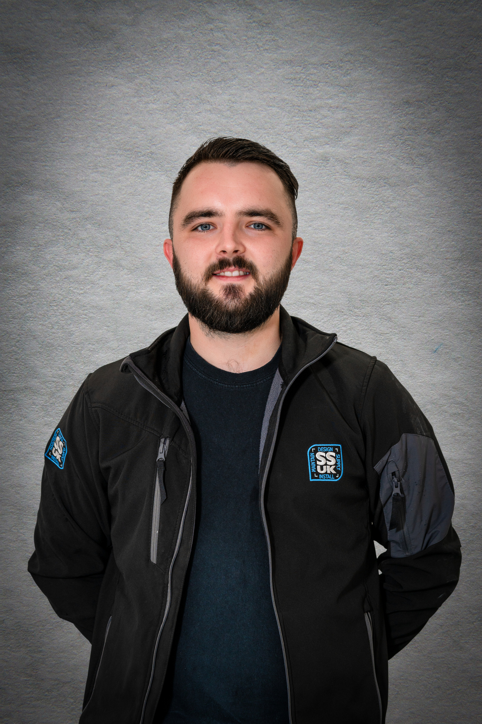Scotland client posing for studio background replacement headshots from SSUK at Glasgow - Photography by Nate Cleary