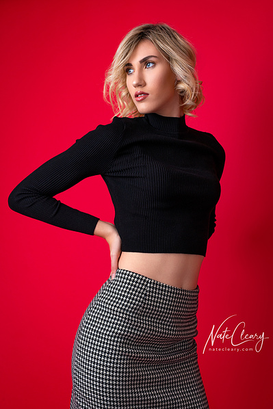 Top model in Glasgow poses for clothing line outdoors for best Scotland fashion photographer in commercial photo shoot - Photography by Nate Cleary