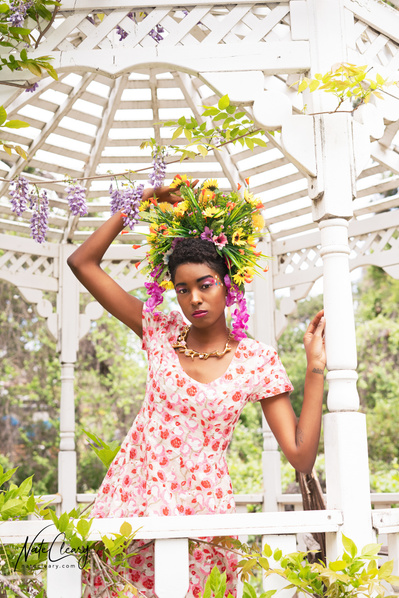 Top Glasgow model poses for clothing line in a garden for best Scotland commercial photographer at fashion photoshoot - Photography by Nate Cleary