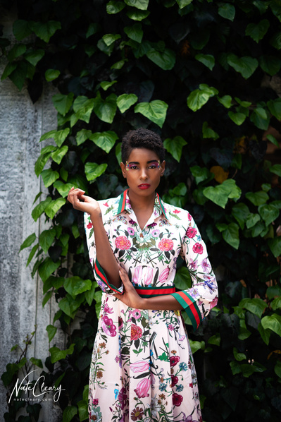 Top Glasgow model poses for clothing line in a garden for best Scotland commercial photographer at fashion photoshoot - Photography by Nate Cleary
