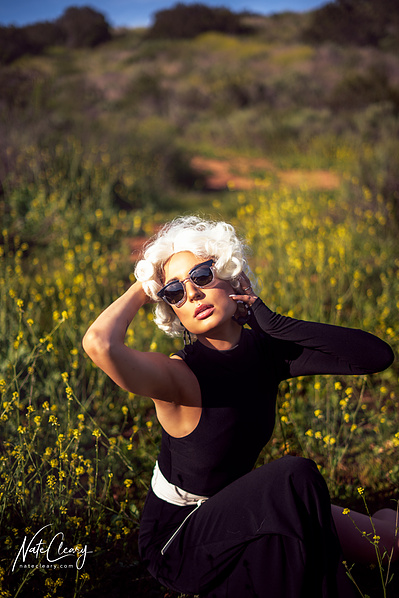 Best Glasgow model poses for creative clothing brand in a field for Scotland top fashion photographer at commercial photoshoot - Photography by Nate Cleary