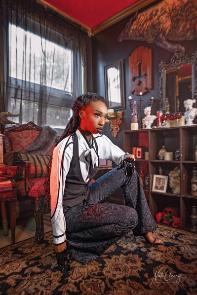 Top agency model in Scotland poses for clothing line in studio for best Glasgow commercial photographer in fashion photo shoot - Photography by Nate Cleary